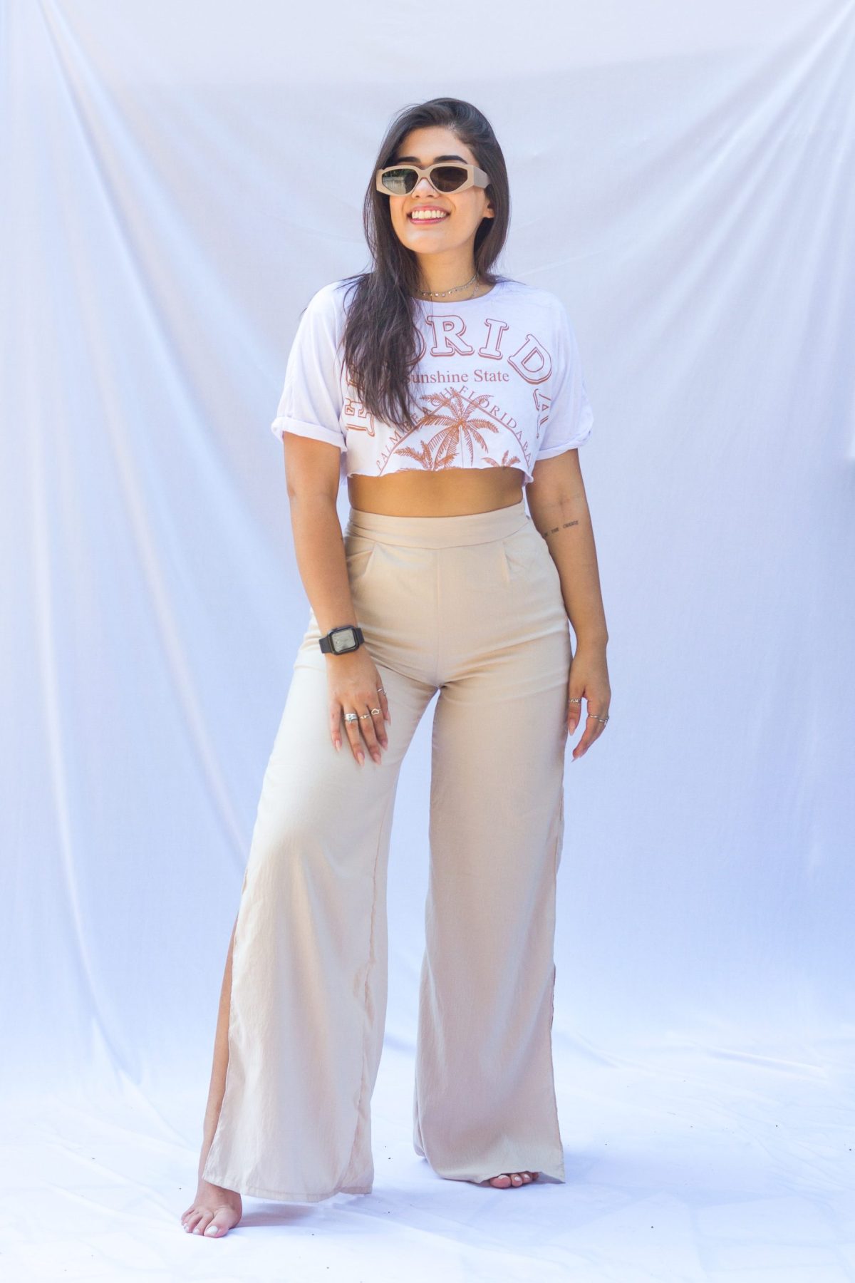 High-waisted pants with a cropped top